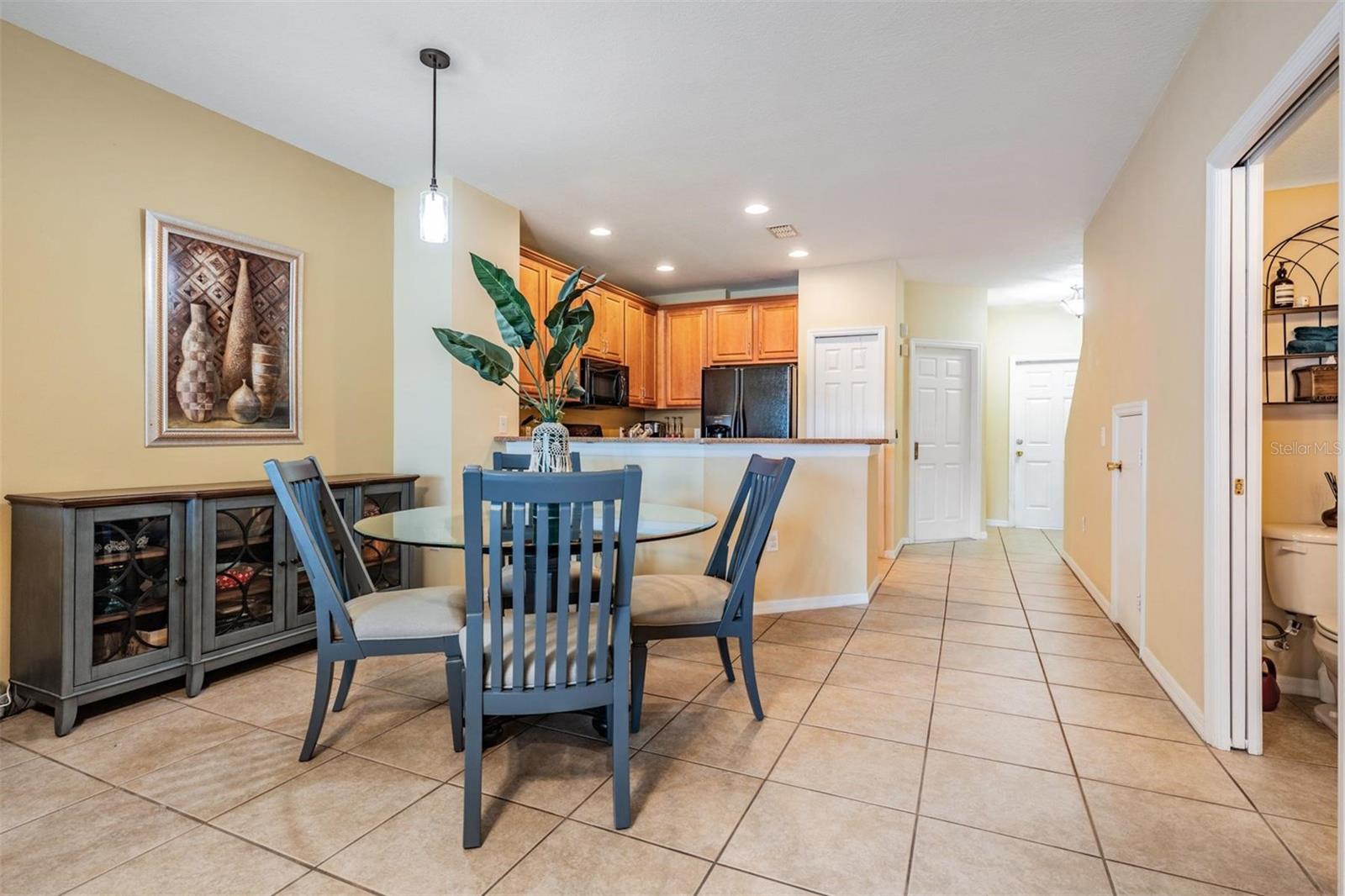 Dining Room Looking to Front Door and Kitchen