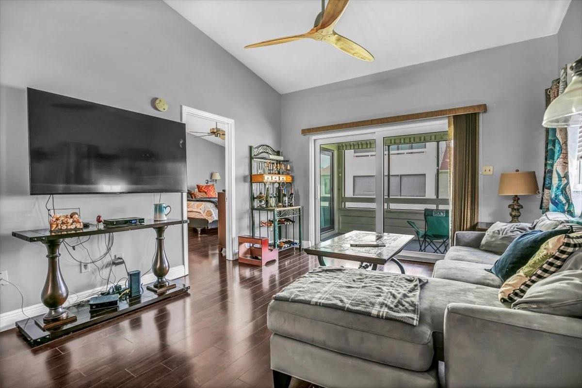 Living room and slider leading to the balcony.