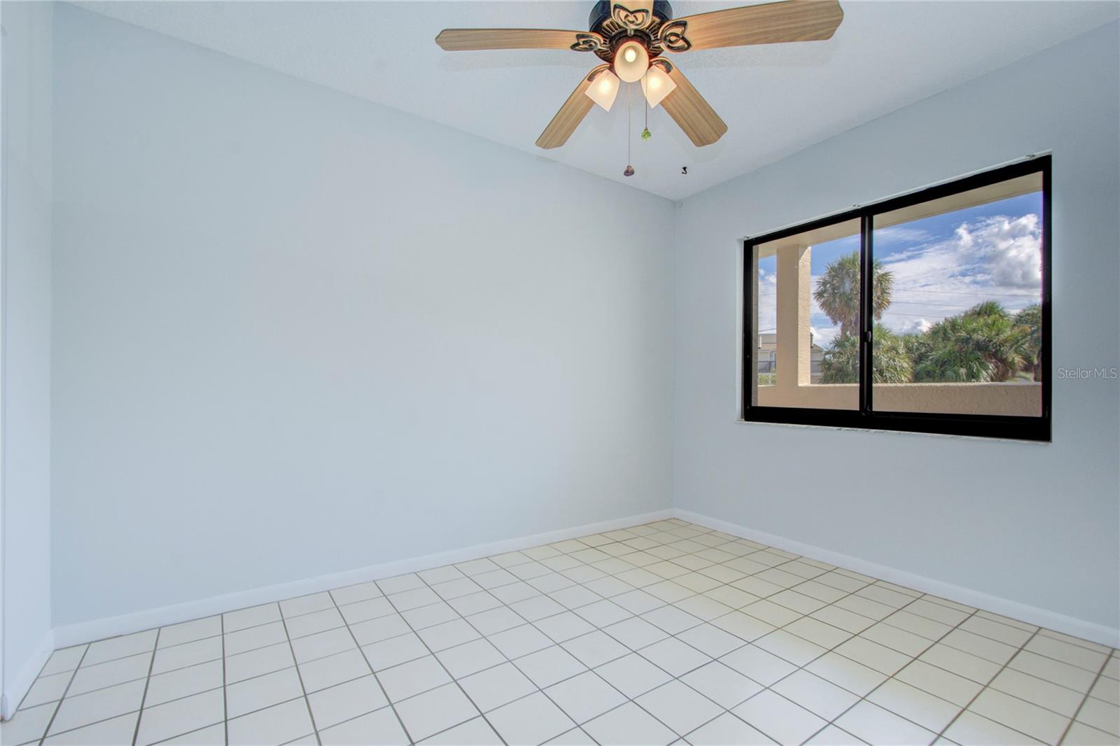 Dining area with bar that opens to kitchen for additional seating and a wet bar for entertaining.