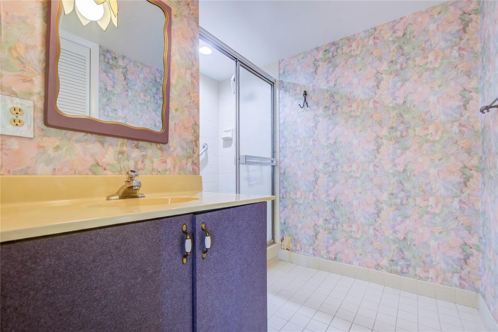 En-suite 3-room Bathroom in the owners suite includes this walk in shower/vanity-sink room, with a privacy door.