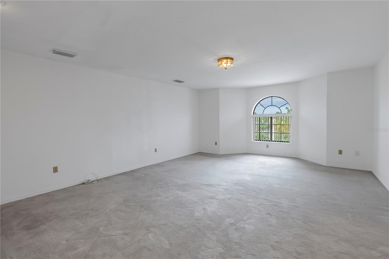 Third floor bedroom with fireplace