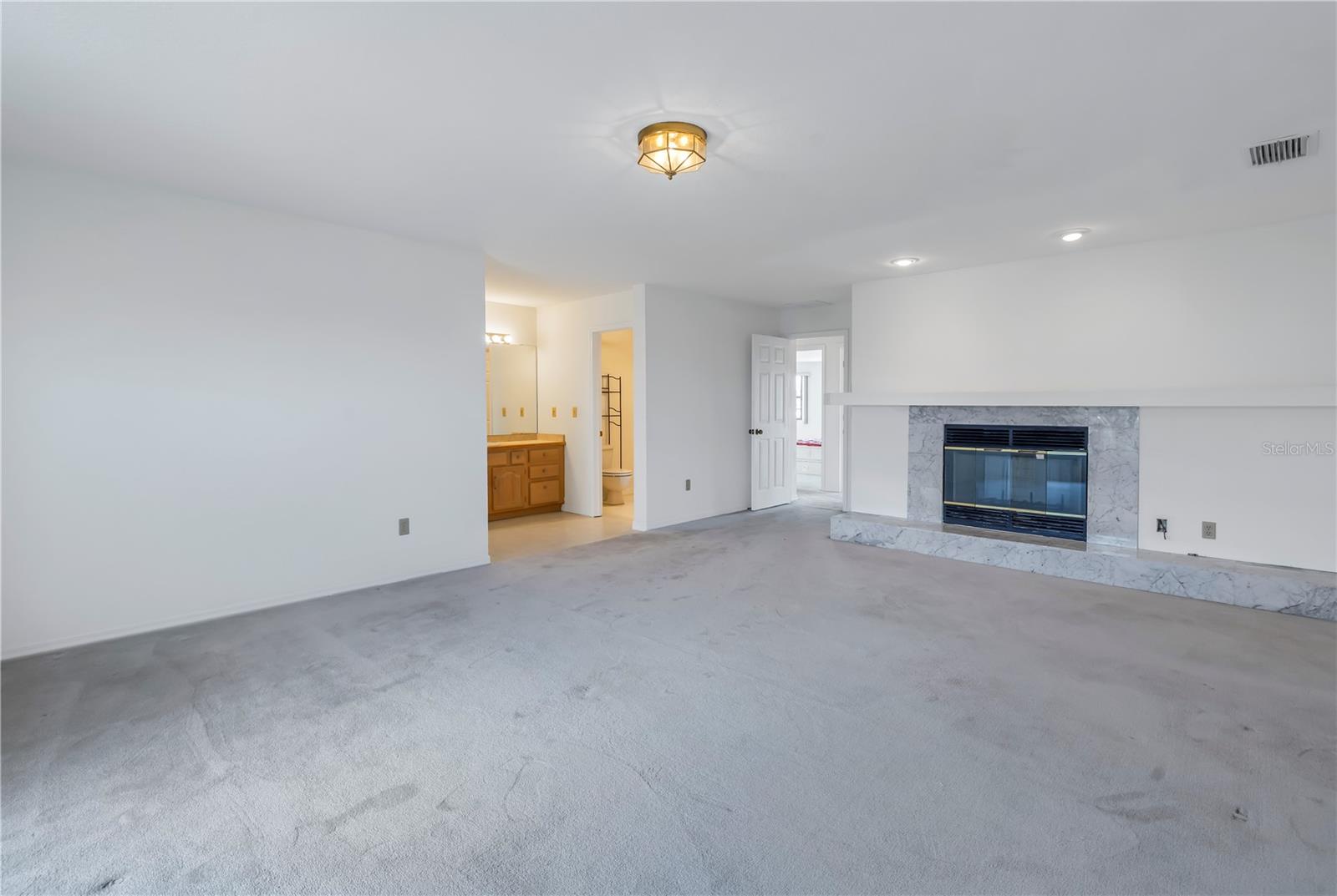 Third floor bedroom with fireplace