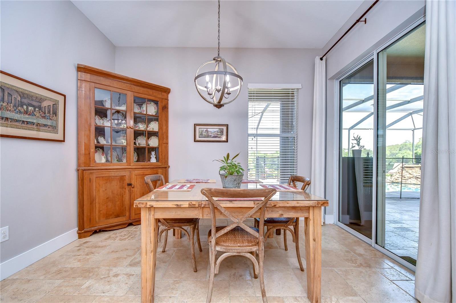 Bright breakfast nook with sliders to the lanai!