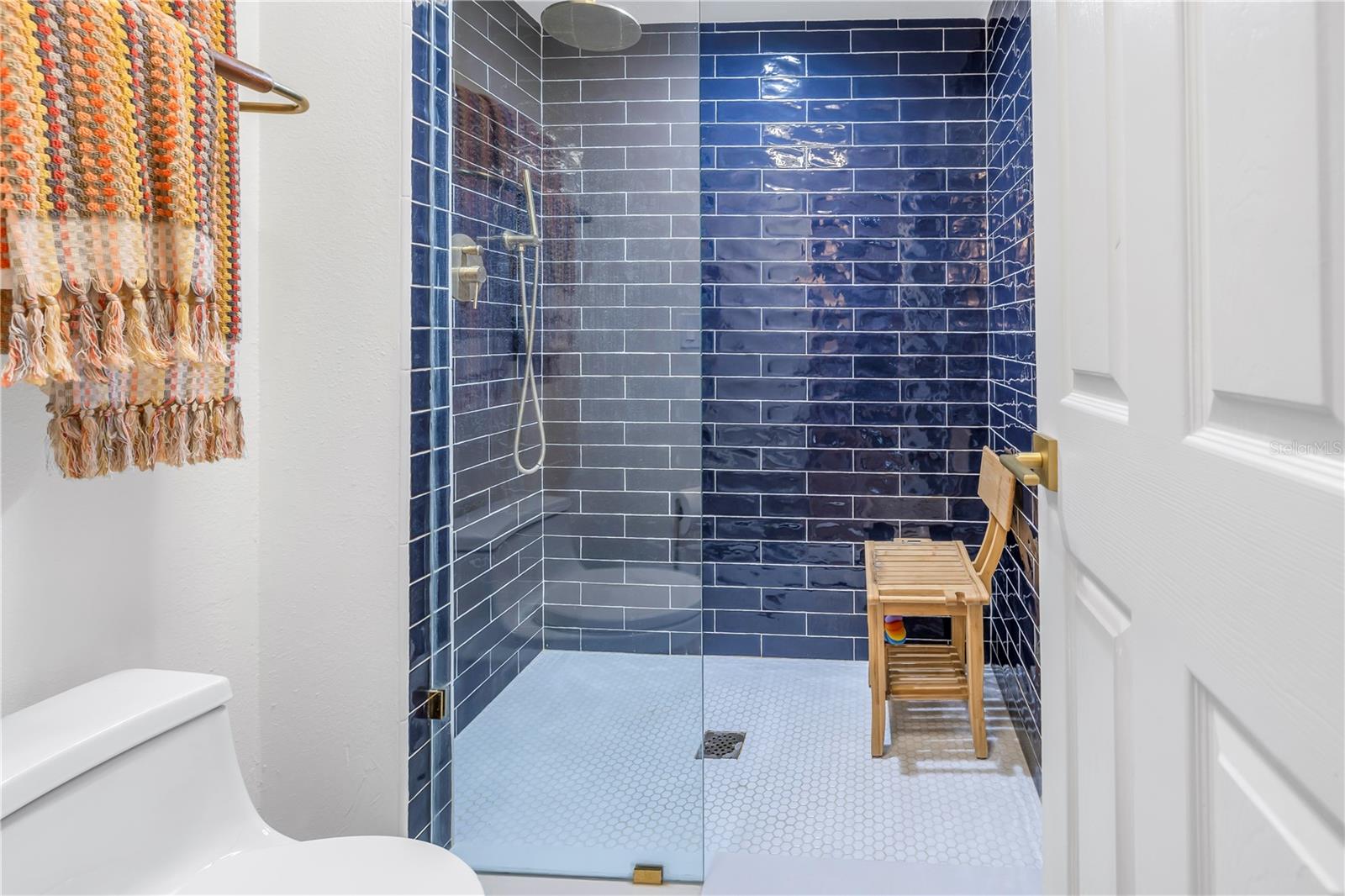 Primary En suite Shower navy subway tile