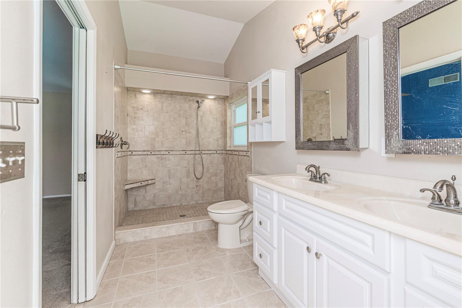 Primary bathroom walk-in shower.