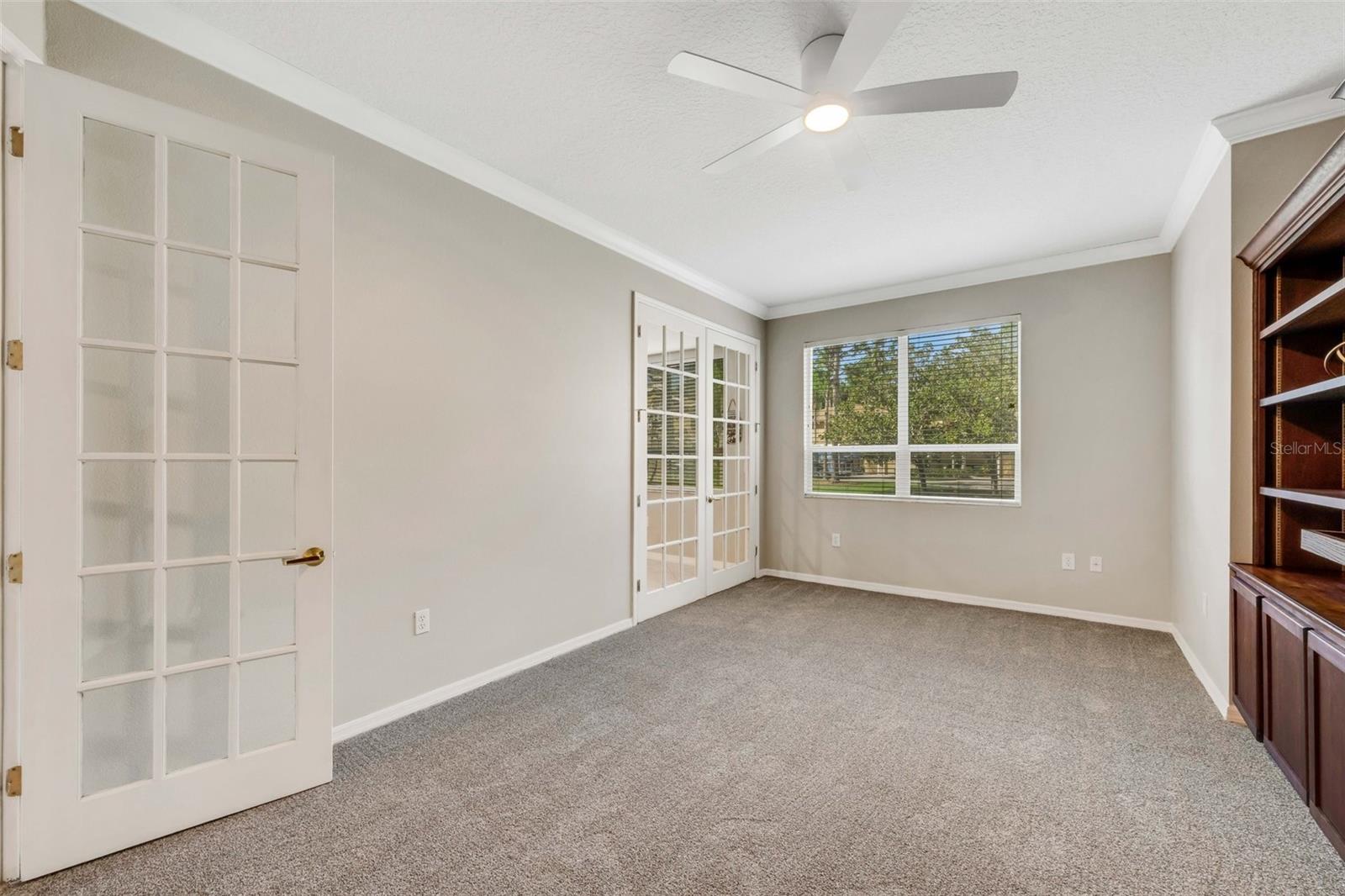 Bonus room with French doors that lead to the kitchen!