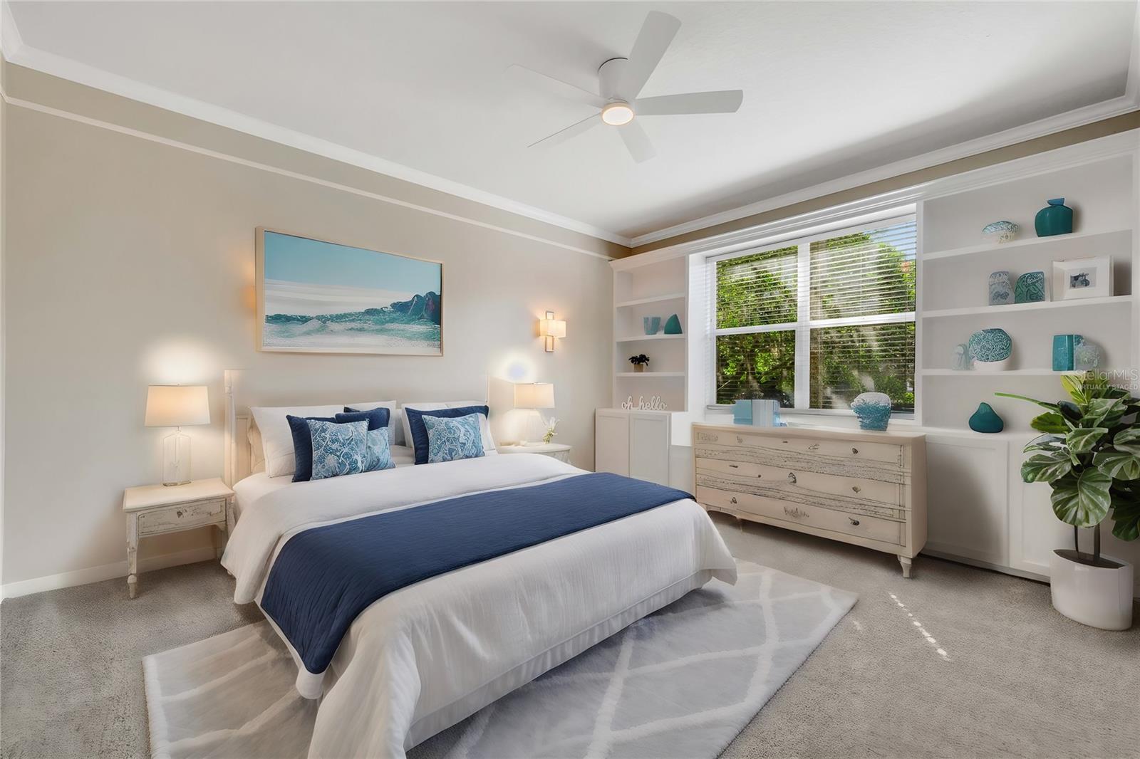 Virtually staged primary bedroom with built-in shelves