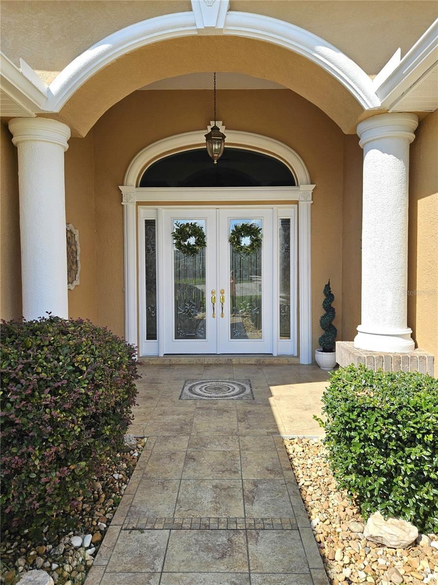 Grand Covered Entry with Double Leaded Glass Doors