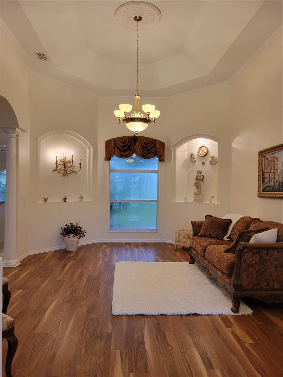 Formal Living Room with Trey Ceiling & New Plank Flooring