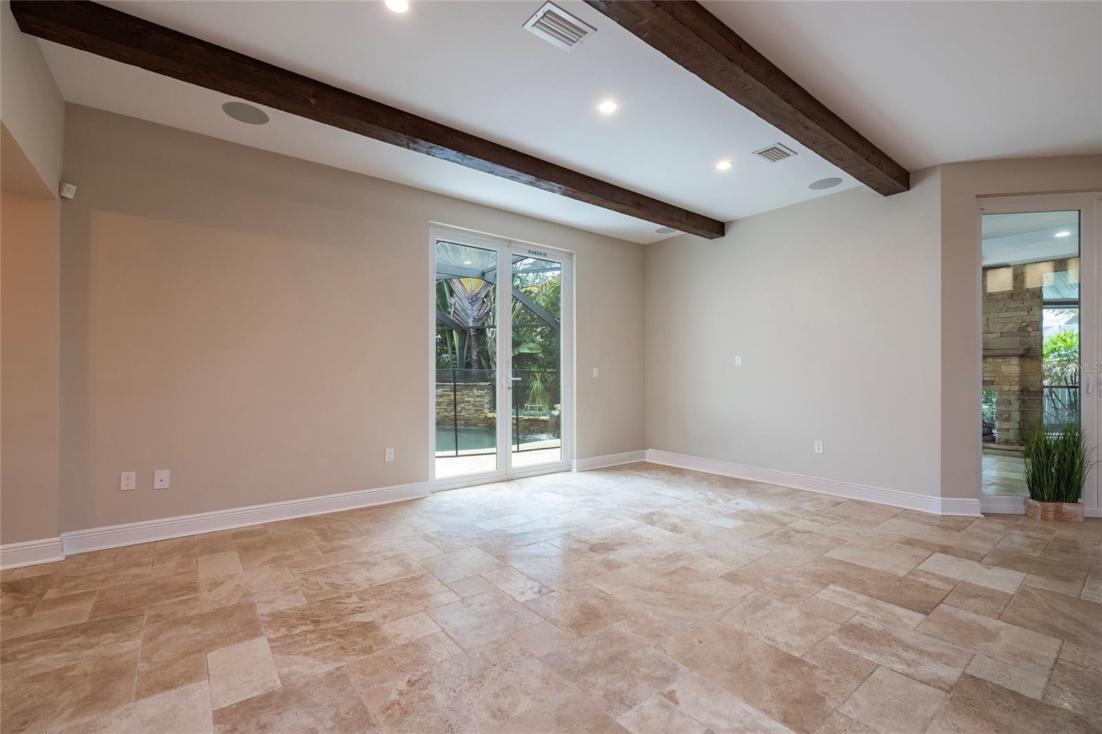 Family room with access to pool and patio