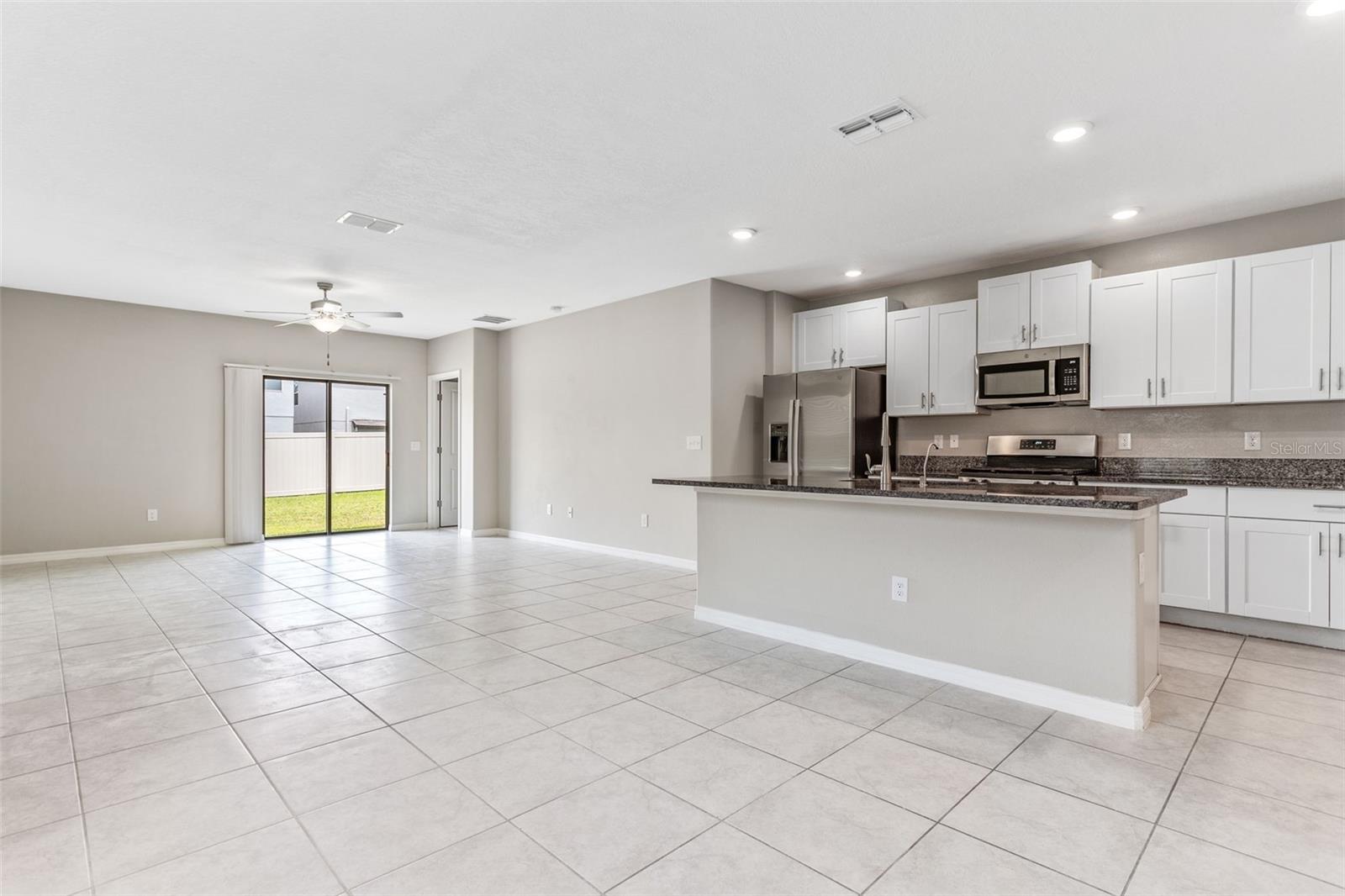 sliding glass doors leading to back yard