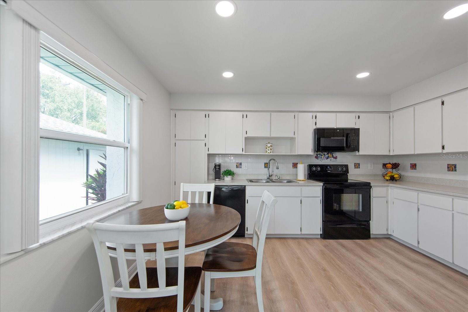 Refinished ceiling with recessed lighting~