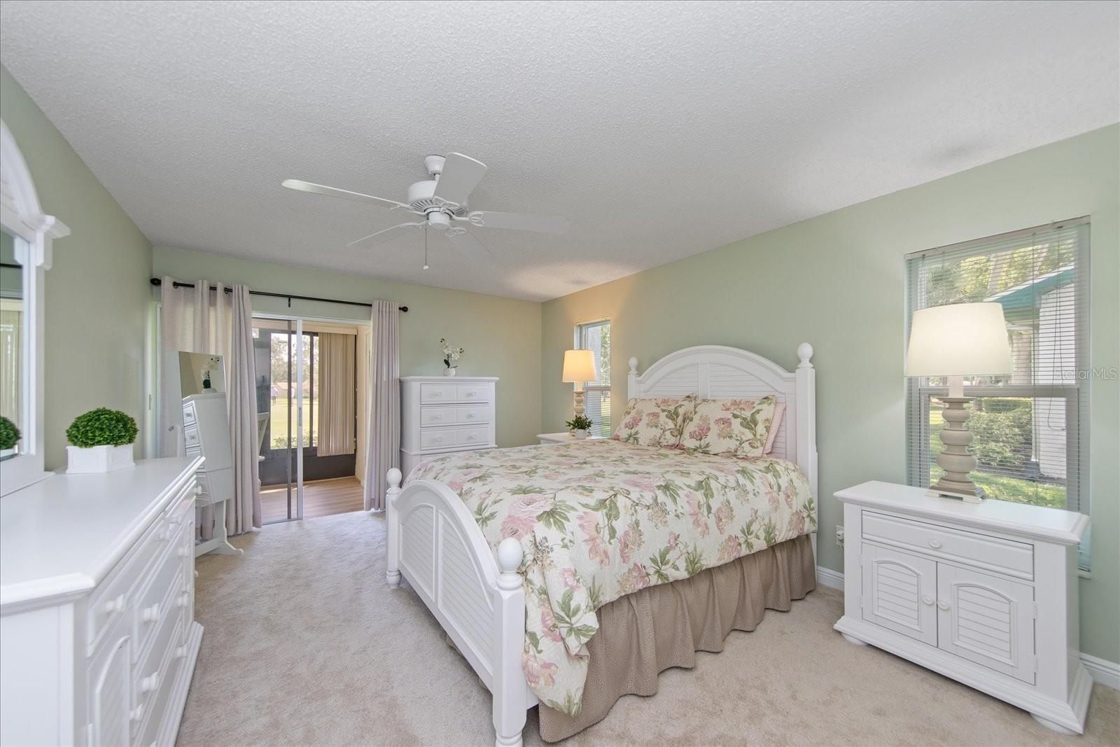 Large master suite with easy access to Florida room & laundry closet~