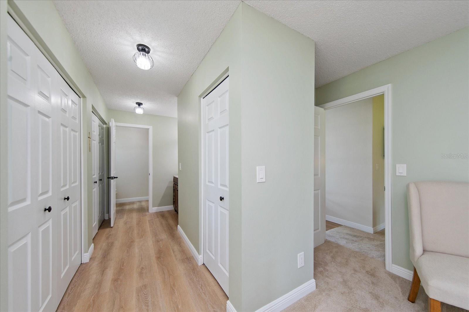 Large dressing & vanity area with great lighting & generous closets~