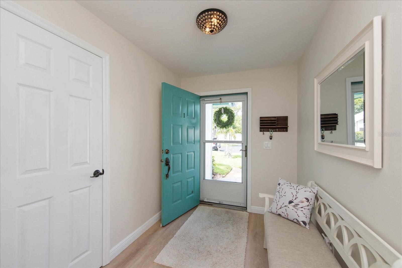 Gracious foyer with entry closet~