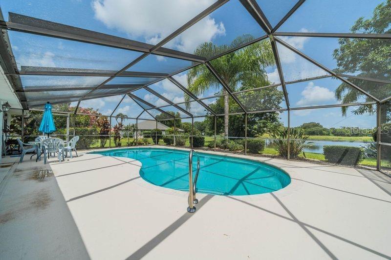 Pool deck with pond view