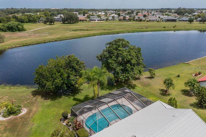 View of pond and golf course