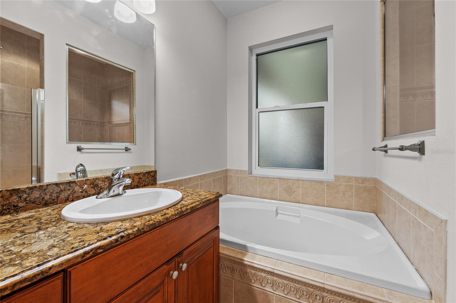 Large Soaking Tub in the Primary Bathroom & a large shower