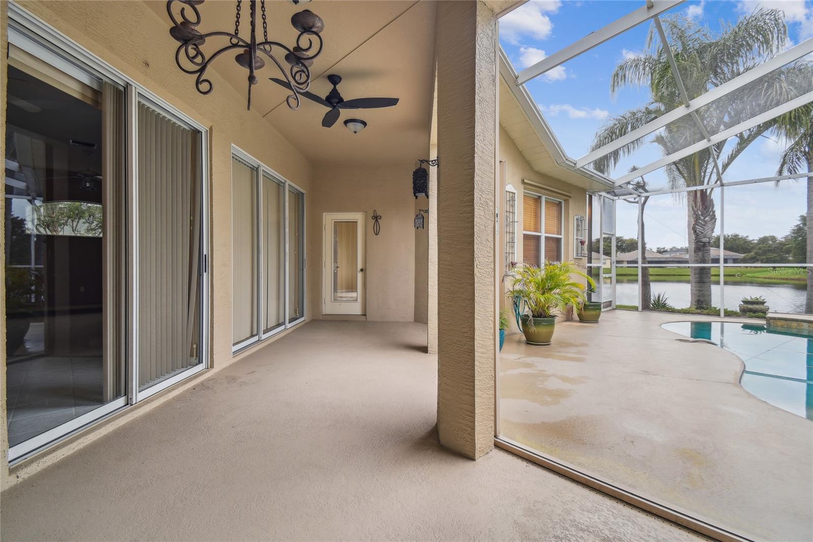 Covered outdoor patio with Hurricane Shutters