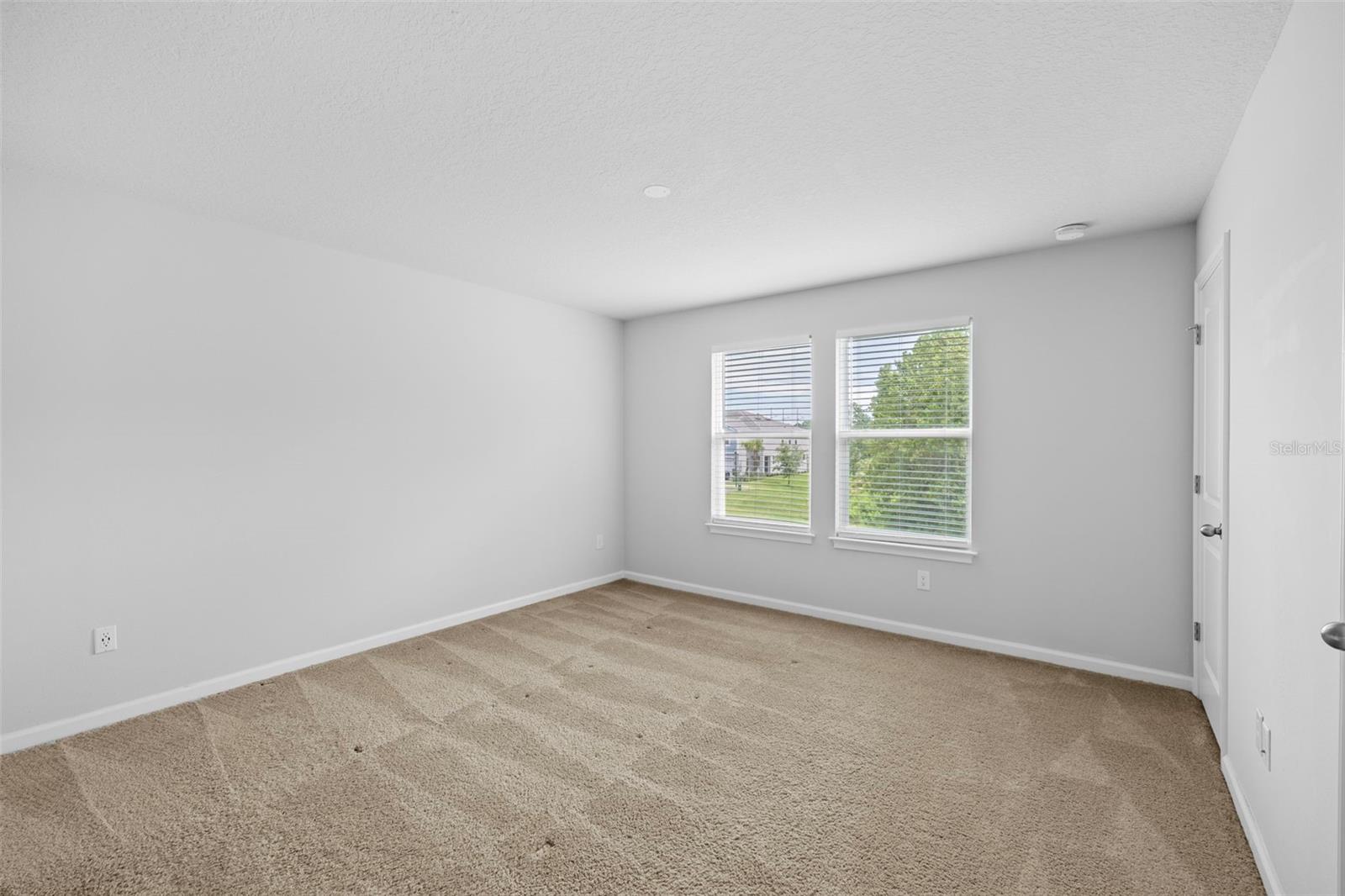 Master Bedroom with Dual Walk-In Closets