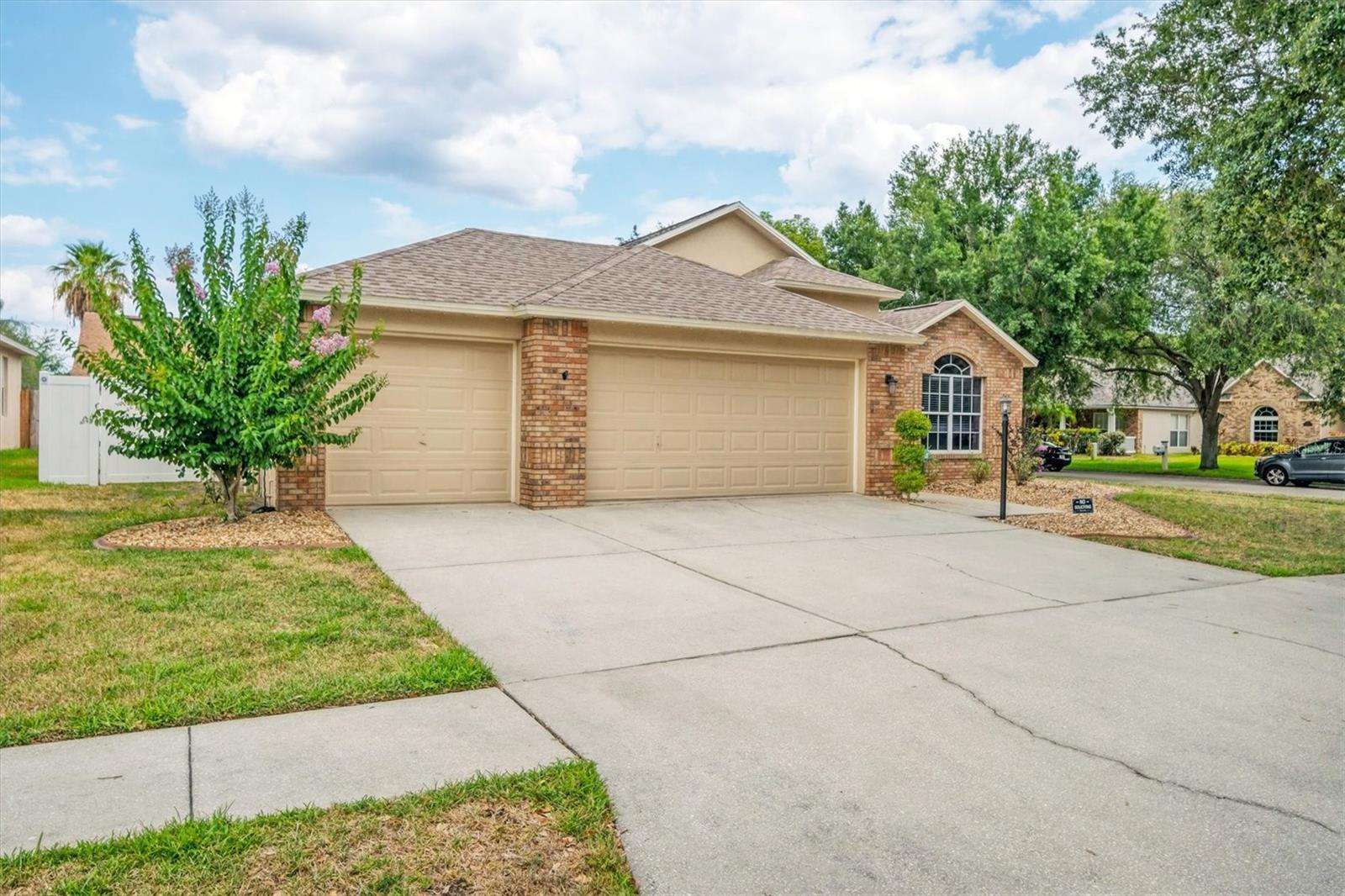 Desirable 3 car garage with automatic door openers