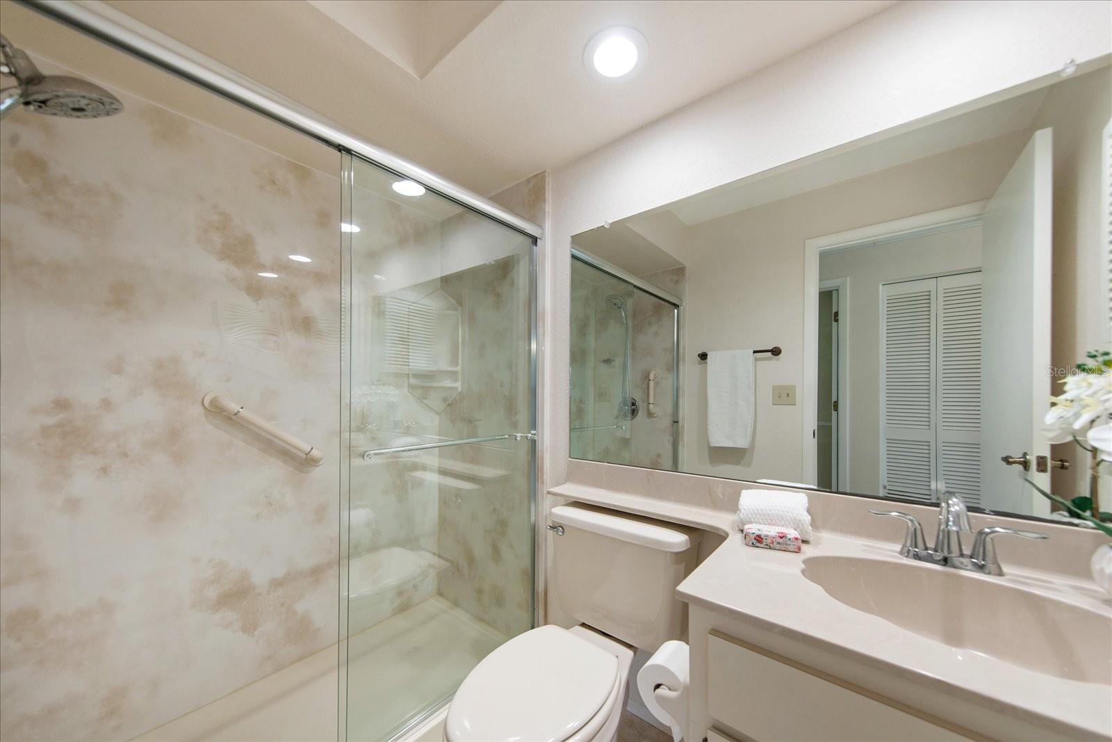 Guest bathroom with newer shower & fixtures convenient to secondary bedrooms~