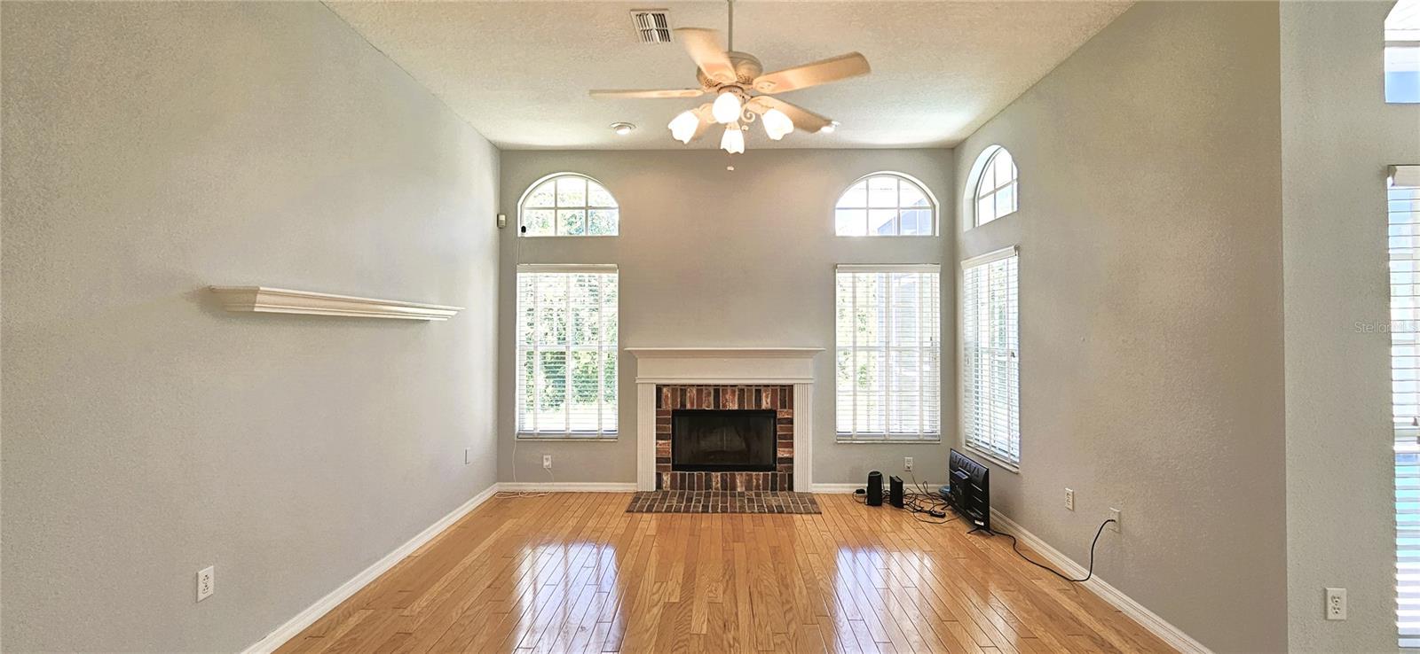 Wood burning fireplace in the family room