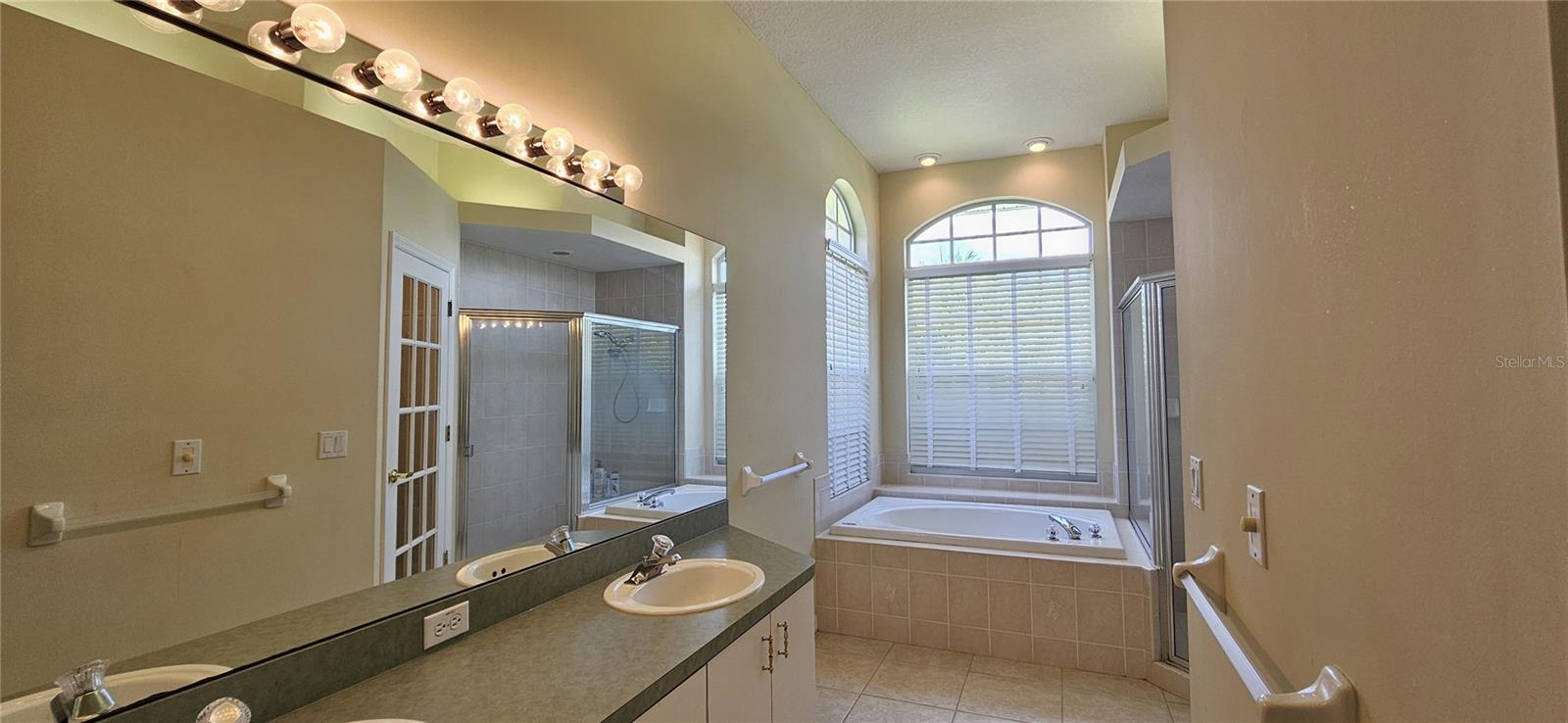 Master includes a private water closet, walk-in shower, garden tub, dual sink vanity, linen closet