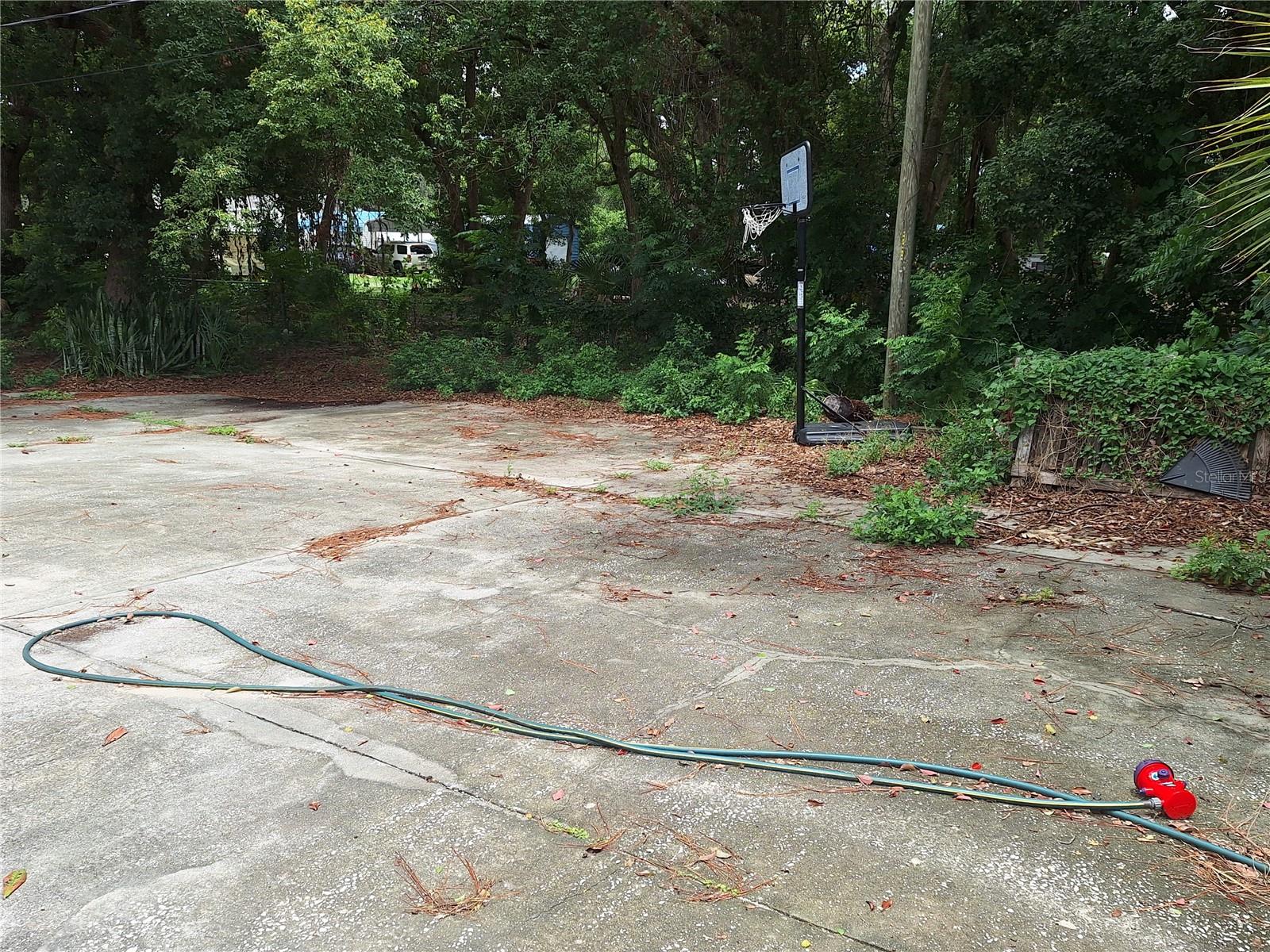 LARGE PAVED COMPOUND HAD RV SET UP AND SEPTIC