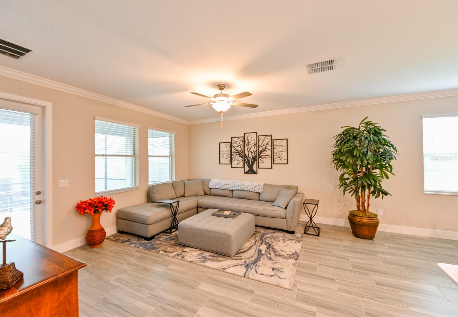 Living Room Opens To Covered & Screened Patio