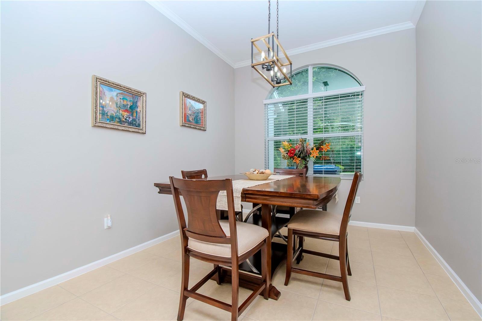 Formal Dining room with crown molding