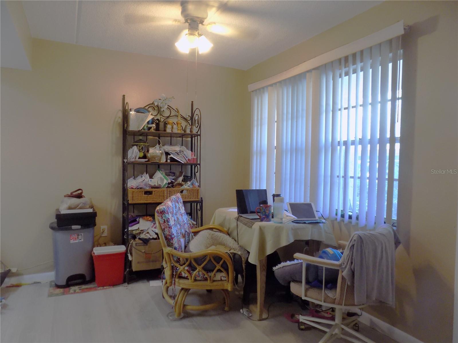 To the right of the unit is your kitchen/dining area, with another large window providing natural light.