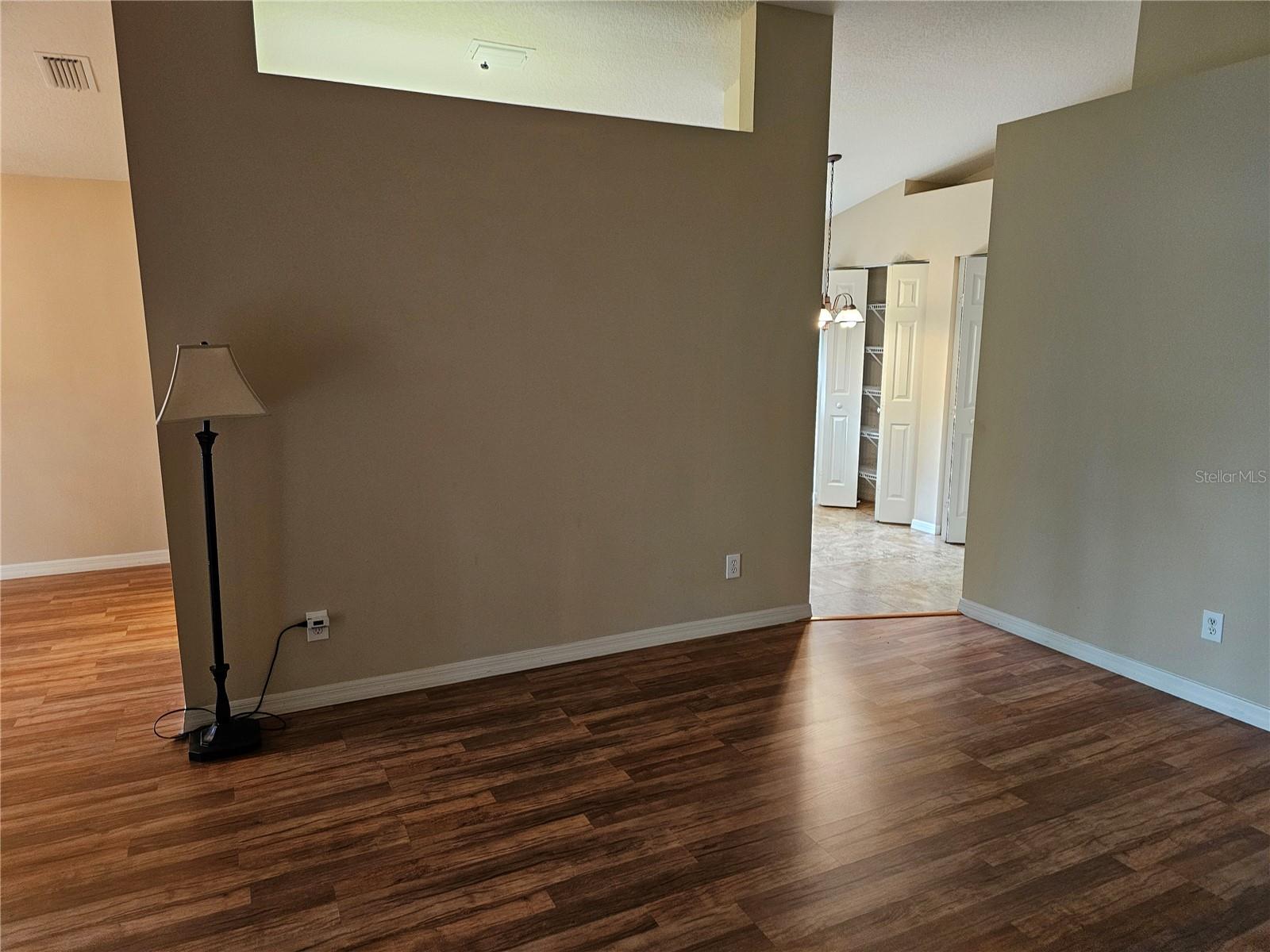 Livingroom facing towards Kitchen