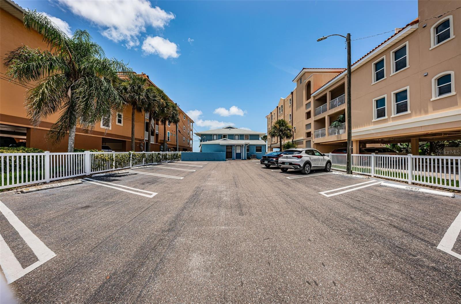 ... Gated Secured Assigned Parking with Additional Guest Spots.. Spot Number 4 is Right Next to the White Car.