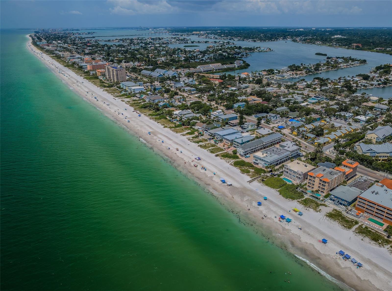 ..Beautiful Aerial of Indian Rocks Beach Looking North.. Miles of Sugar Sand Beaches with Aerial Showcasing the Intracoastal Waterway as Well as the Beaches.. IRB is home Headquarters to Crabby Bills - PJs and Keegans Restaurants - The Le  Mar Located Bottom Right in Photo Next to Orange Roof.