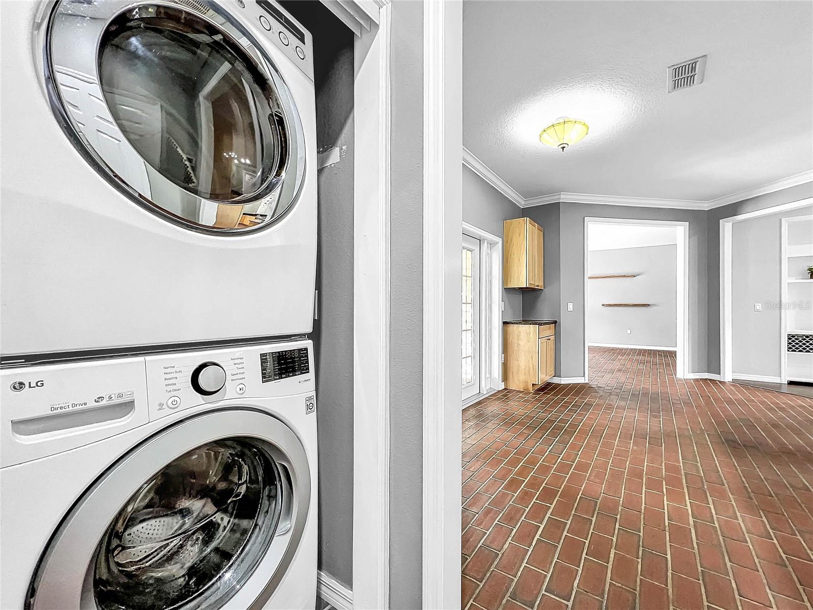 INSIDE LAUNDRY AREA ACROSS FROM THE HALF BATH