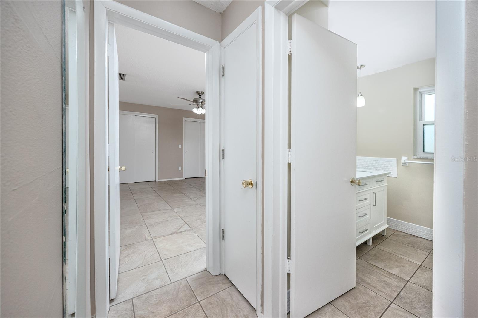 Hallway & primary bathroom