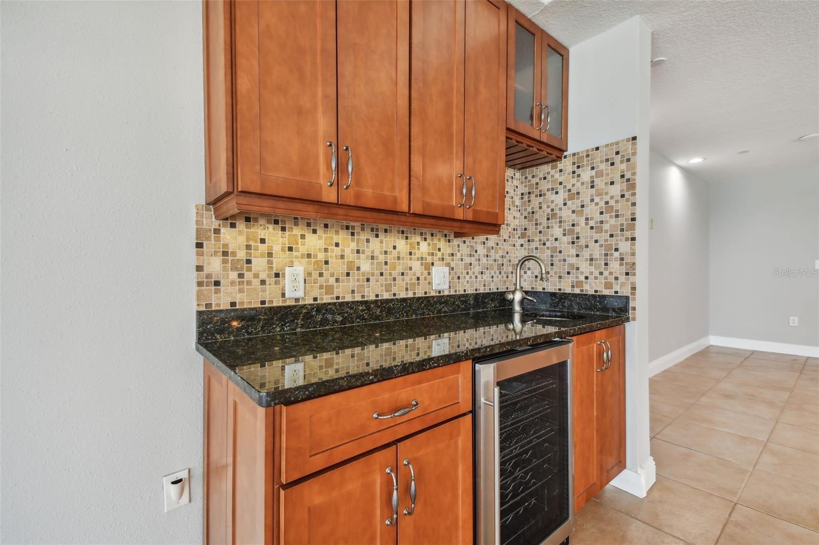 Wet bar with wine refrigerator