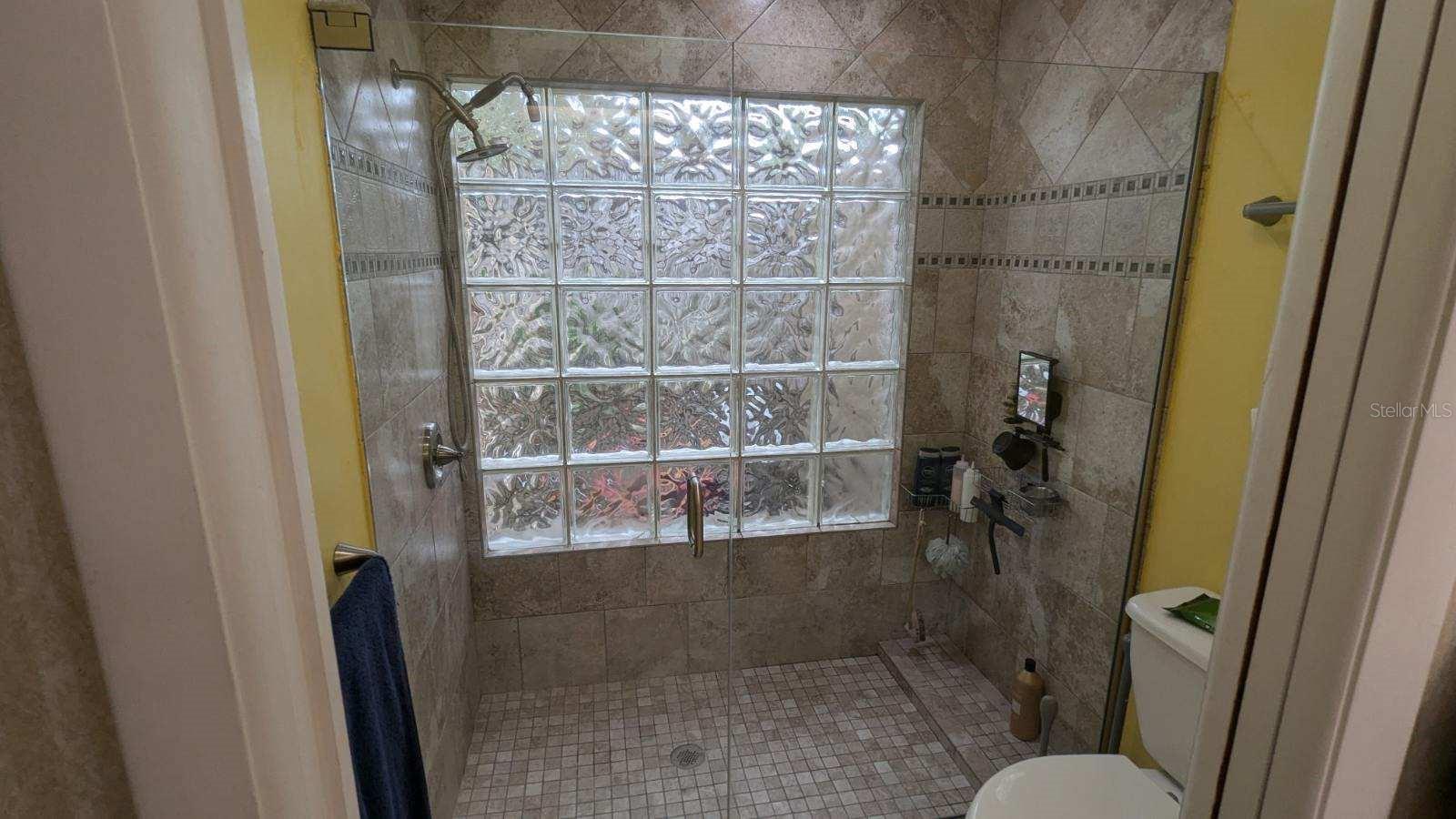 Master Bathroom, walk in tiled shower and double sinks