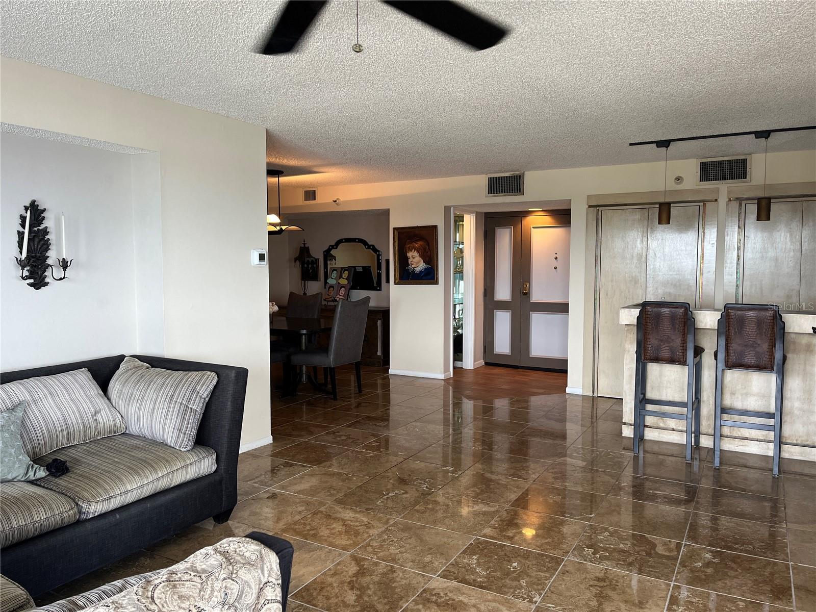 View From Livingroom Towards Entry, Bar, and Dining