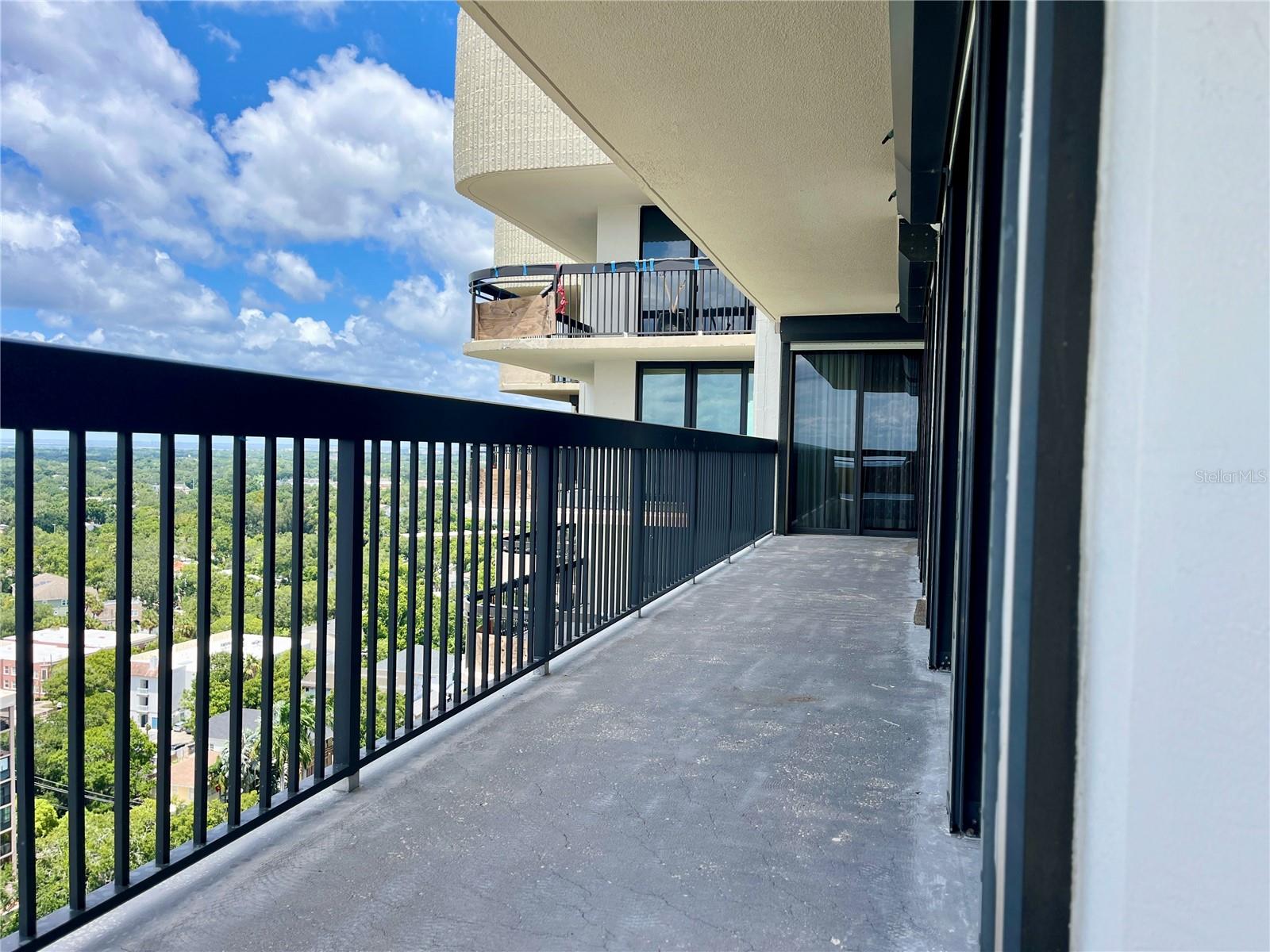 Balcony View Towards Master Suite Sliding Doors