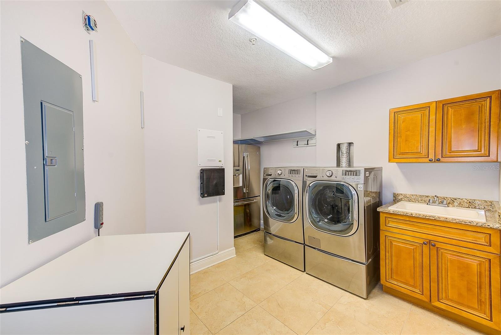 Massive Laundry Room with Sink