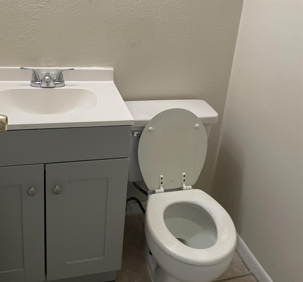 Downstair Powder Room under the stairs