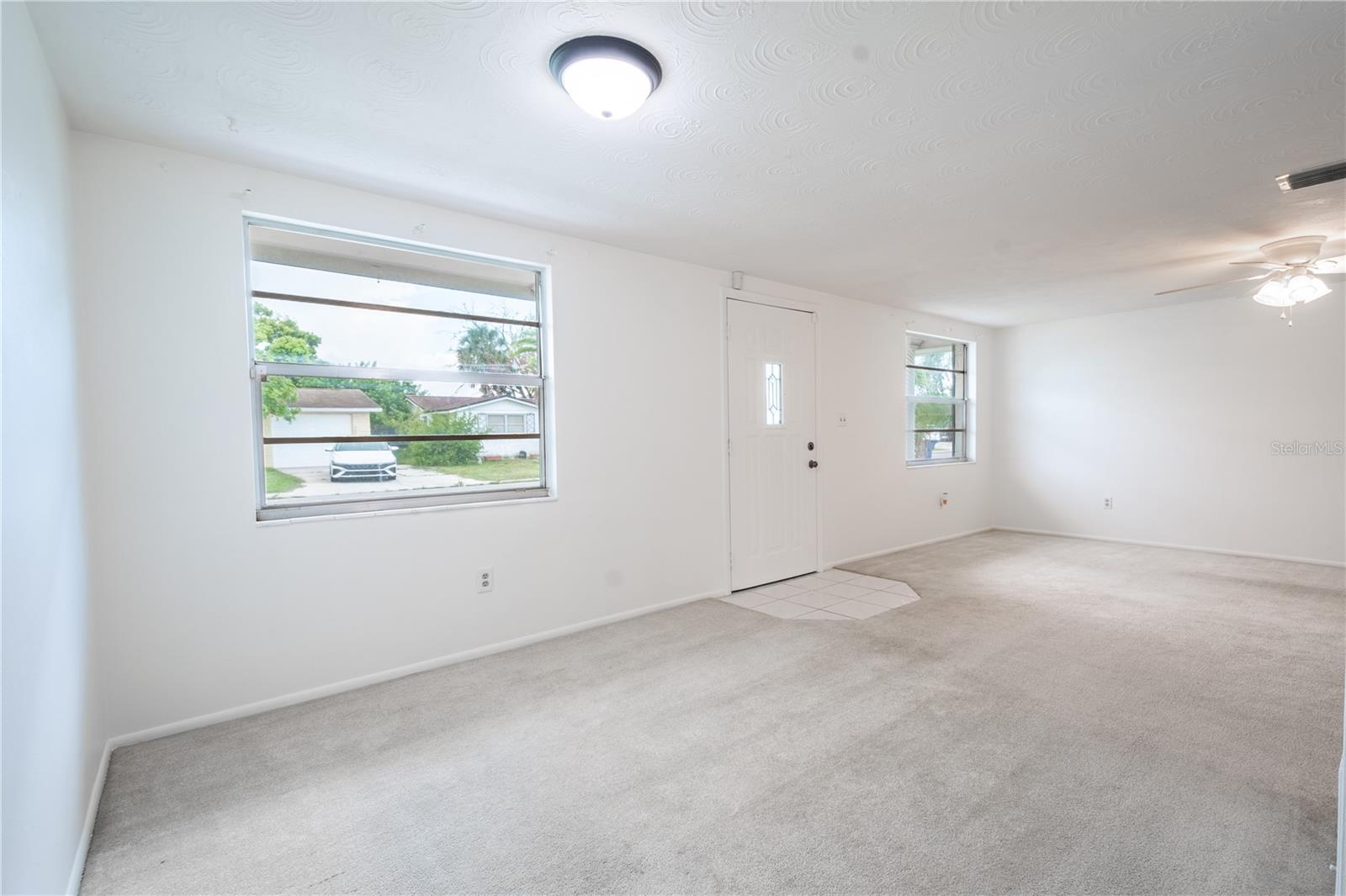 Large windows in the living and dining room brings in plenty of natural light.