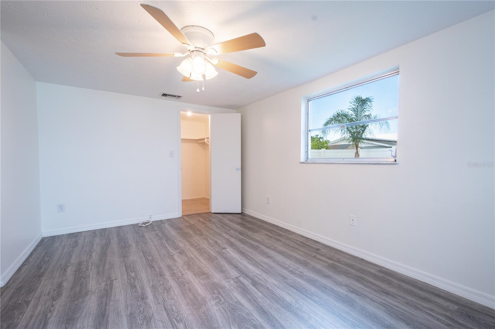 The primary bedroom features a walk-in closet.