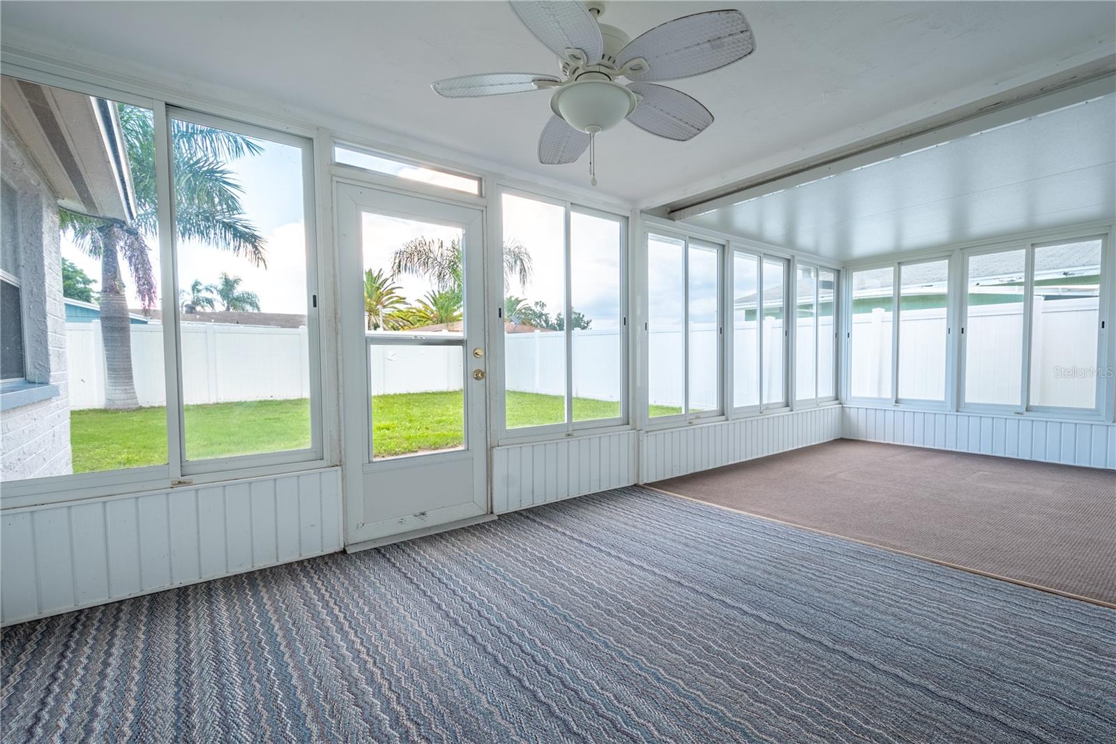 Wall to Wall windows in the enclosed Florida Room