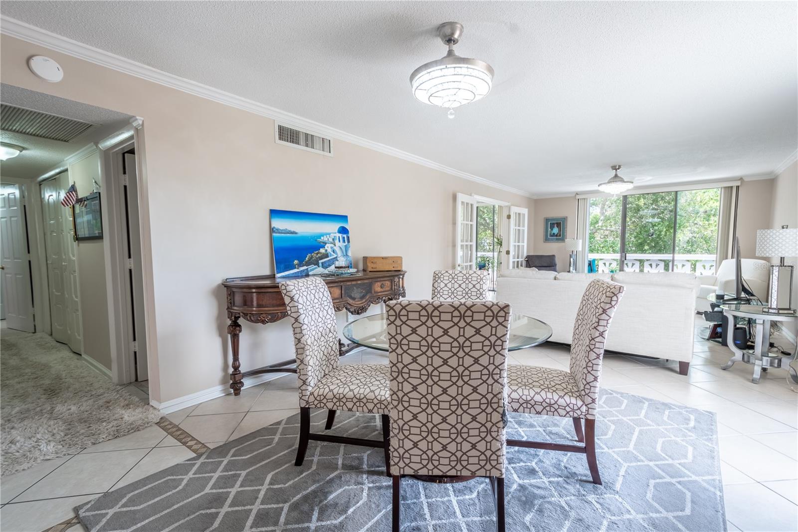 The dining room is bathed in natural light.