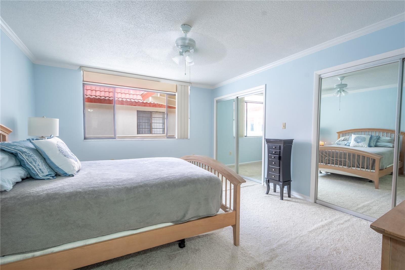 The primary bedroom features dual built-in closets.