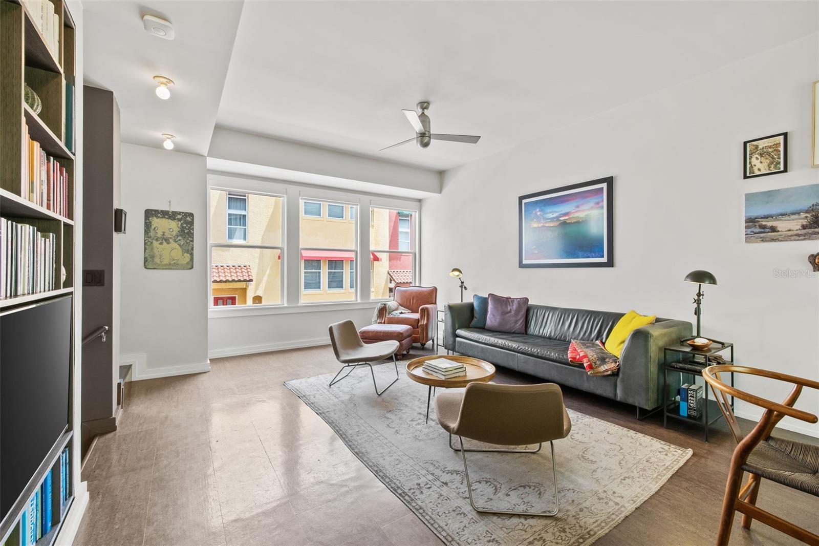 Vaulted ceilings bring light into this spacious room.