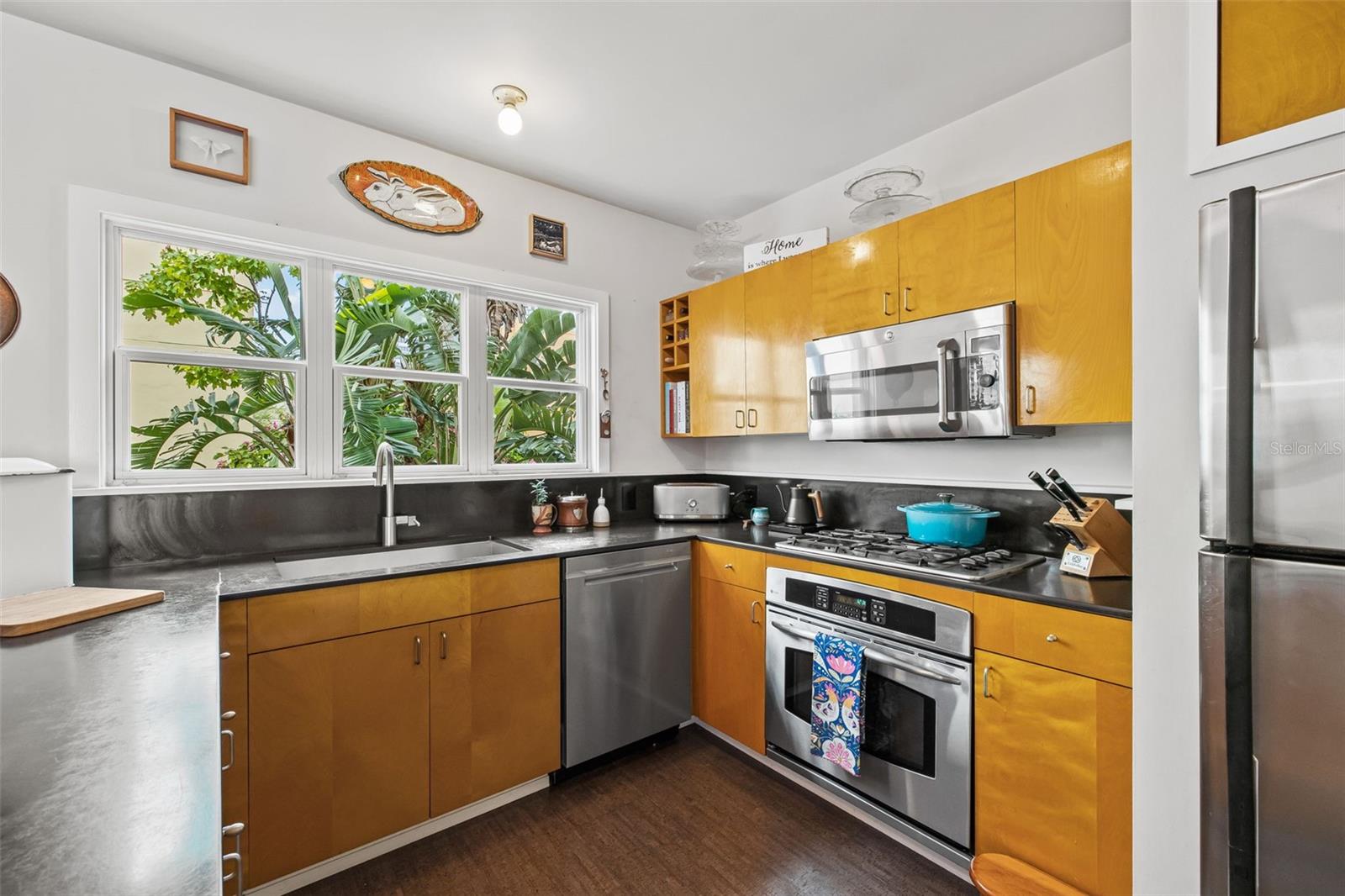 Gas stove is natural gas from the city. Great farmhouse sink.